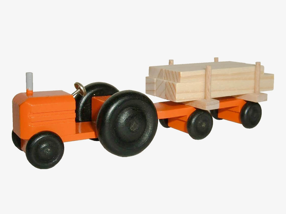 Mini-Traktor-farbig-Schnittholz.jpg kleiner Traktor mit farbigem Schnittholz – Bild 1